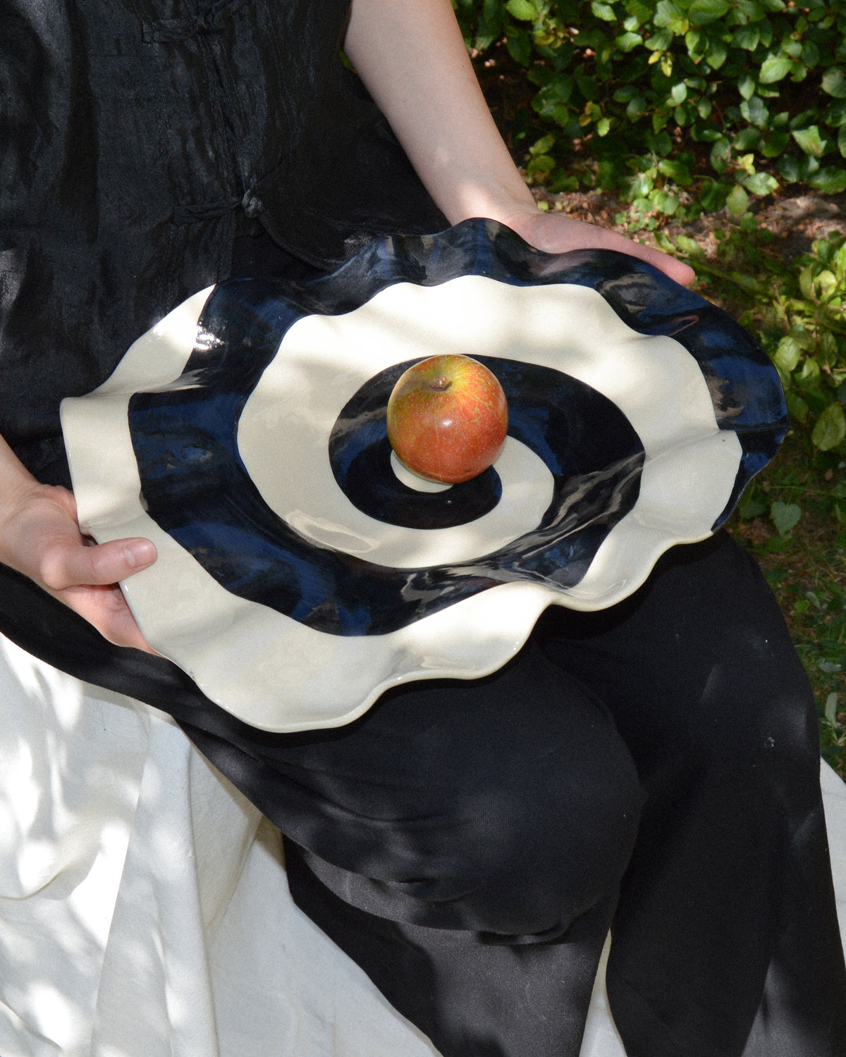 Spiral plate – hand-built stoneware serving plate with a black and off-white spiral
