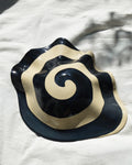 Spiral nautilus – glossy hand-painted stoneware wall piece with a spiral motif
